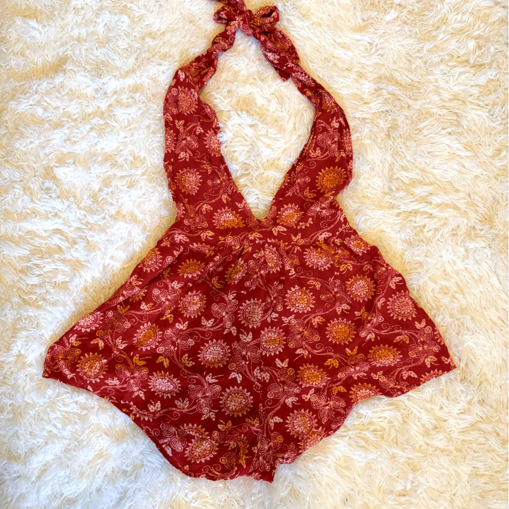 Red open back halter romper